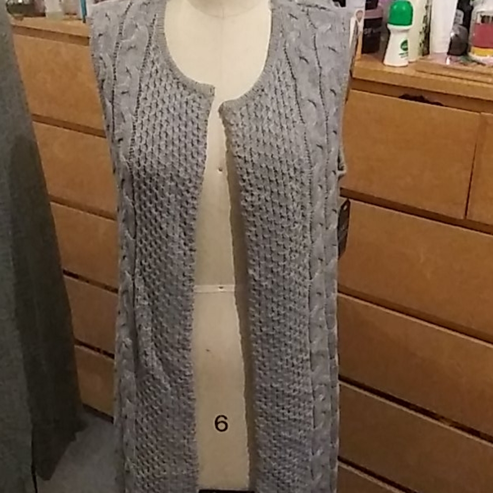 Long sleeveless sweater
